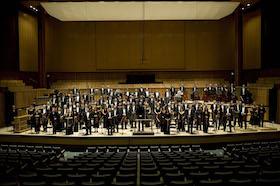 LPO rehearsals and orchestra group shot standing and sitting.