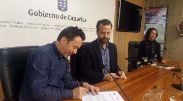 Andermatt y Márquez firmando el convenio