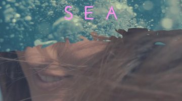 El cartel del cortometraje 'By the sea'